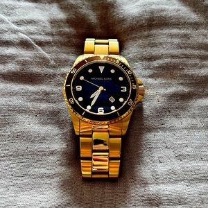 Michael Kors Gold metallic watch with brown dial